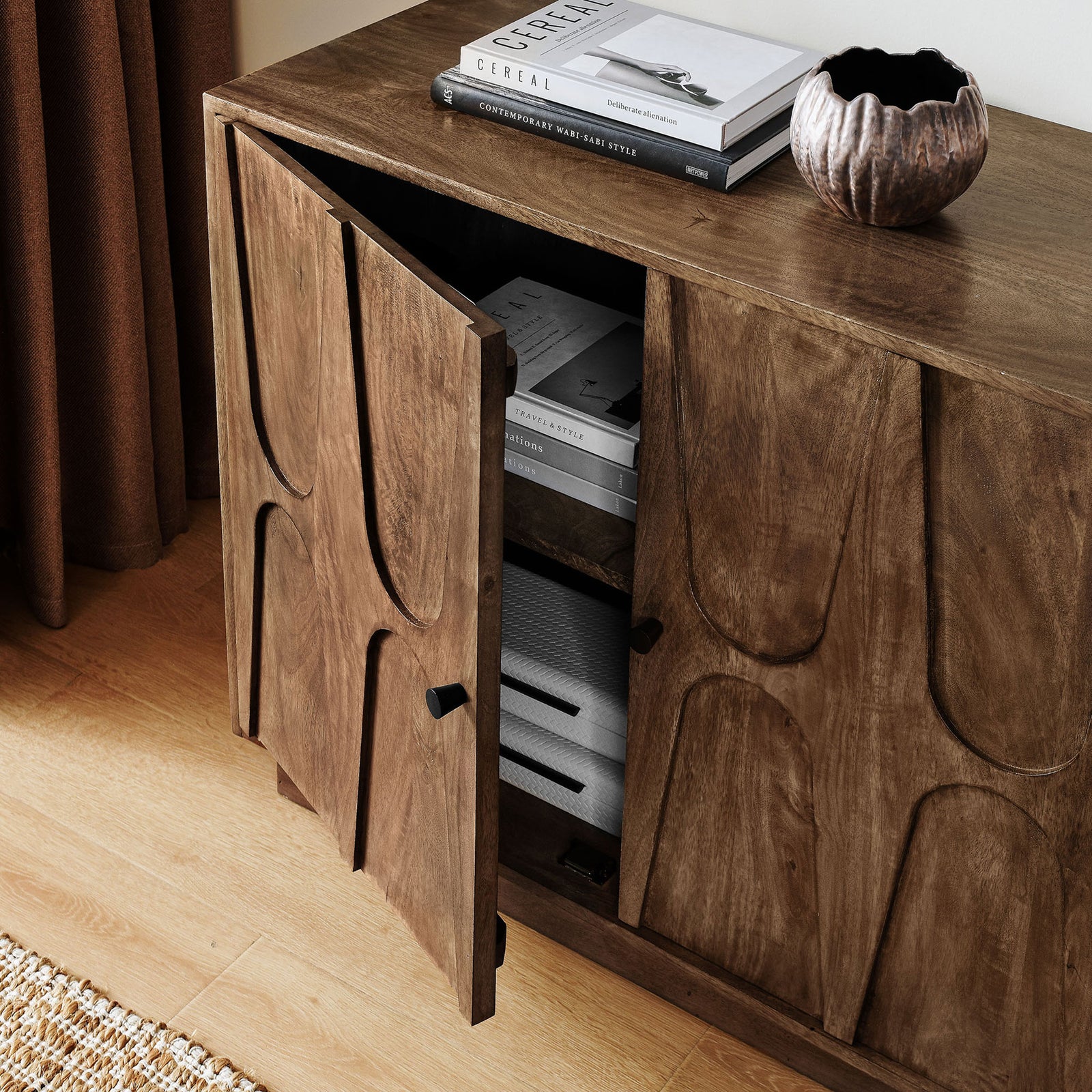 Open cabinet door reveals fixed shelving ideal for organizing books, electronics, and living room essentials || EEI-7285-WAL || storage_open_room