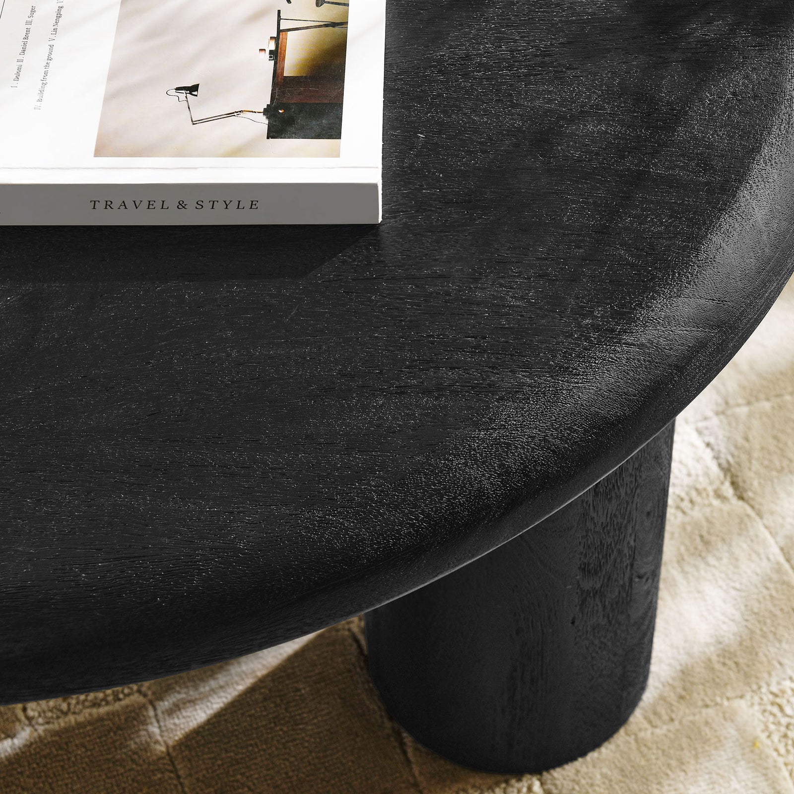 Textured black tabletop adds warmth and depth, pairing easily with modern decor || EEI-7286-BLK || detail_room