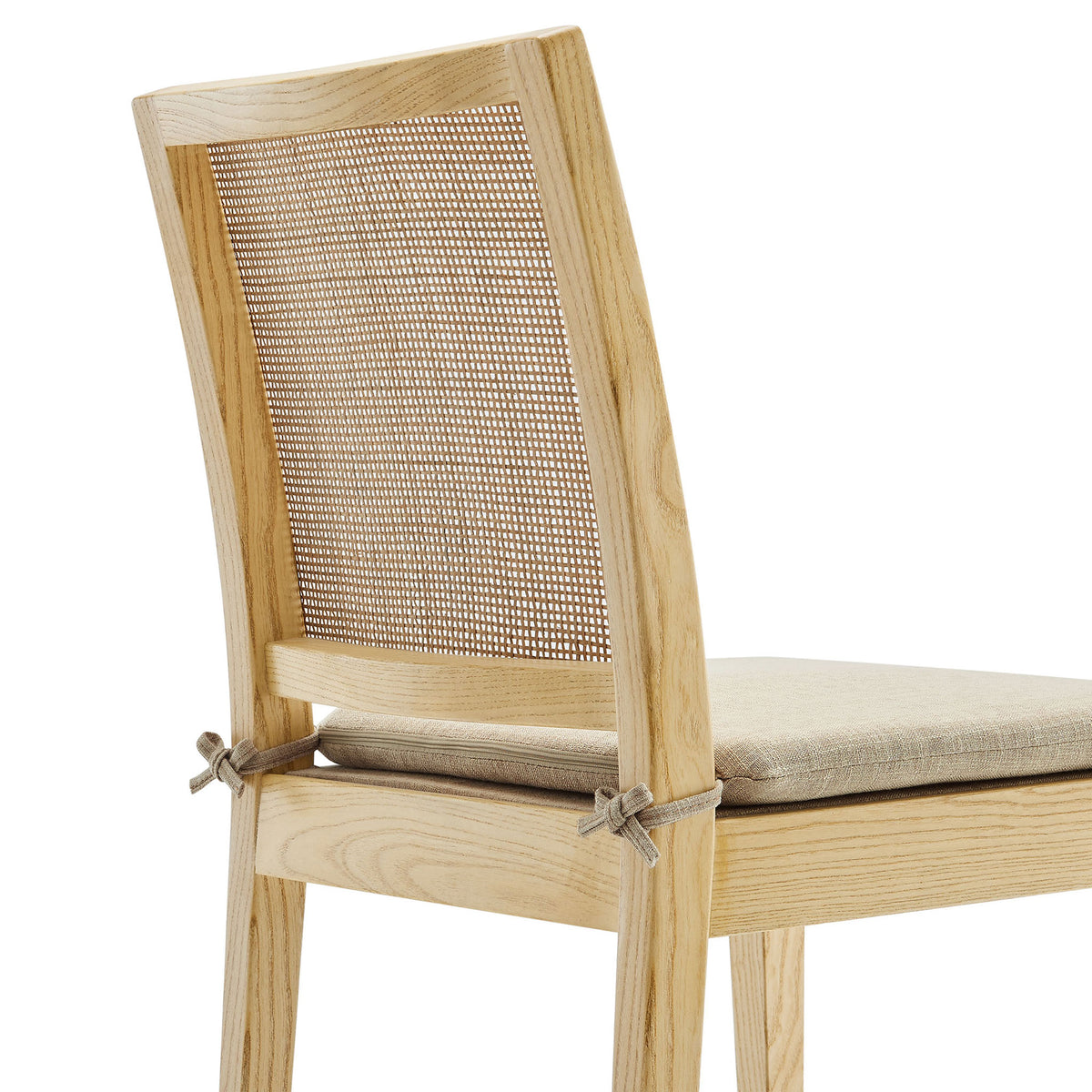 Rattan mesh back and neatly tied removable cushion showcase the refined craftsmanship of this natural wood chair || EEI-7288-NAT-BEI || detail_studio