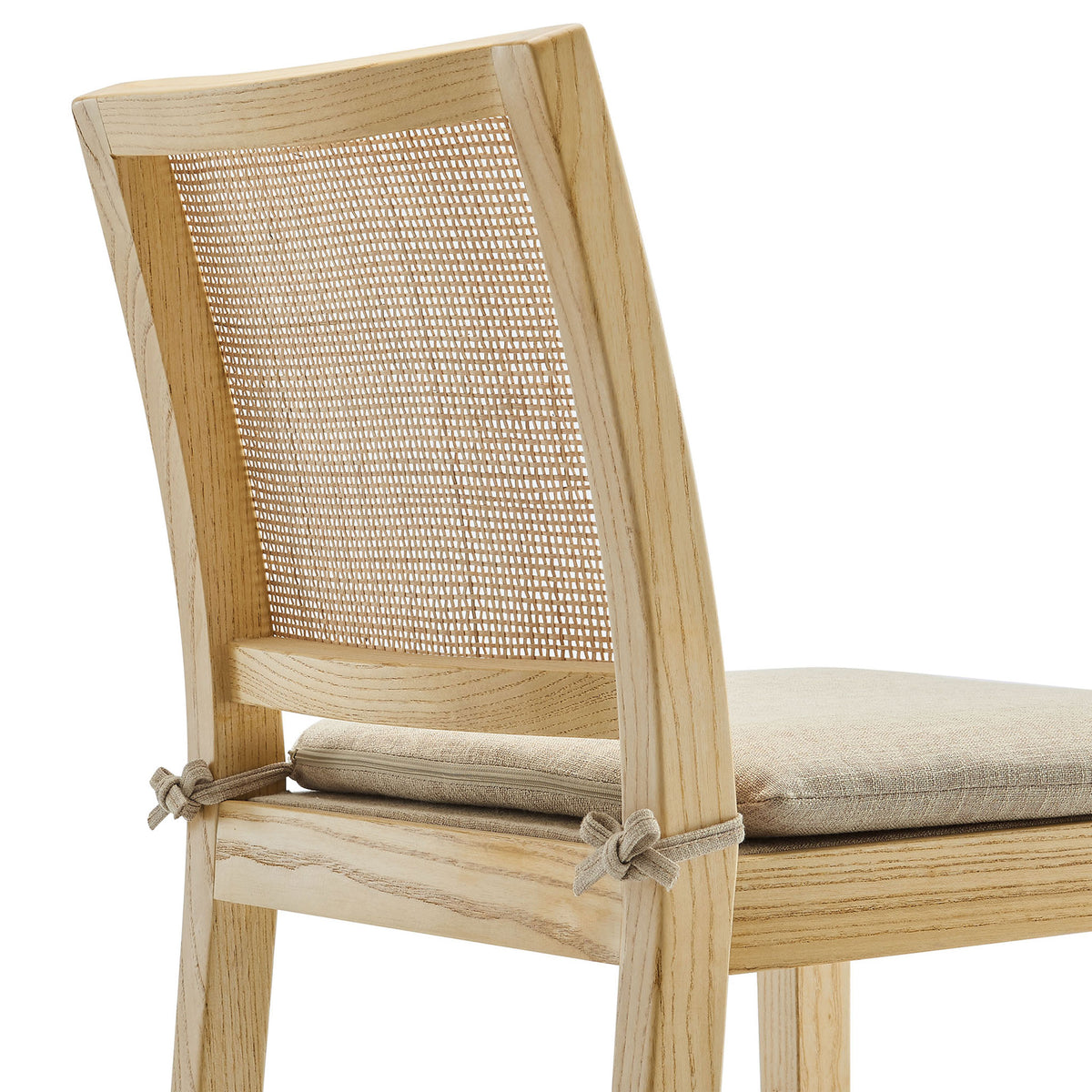 Rattan mesh back and knotted cushion ties showcase thoughtful craftsmanship. || EEI-7289-NAT-BEI || detail_studio
