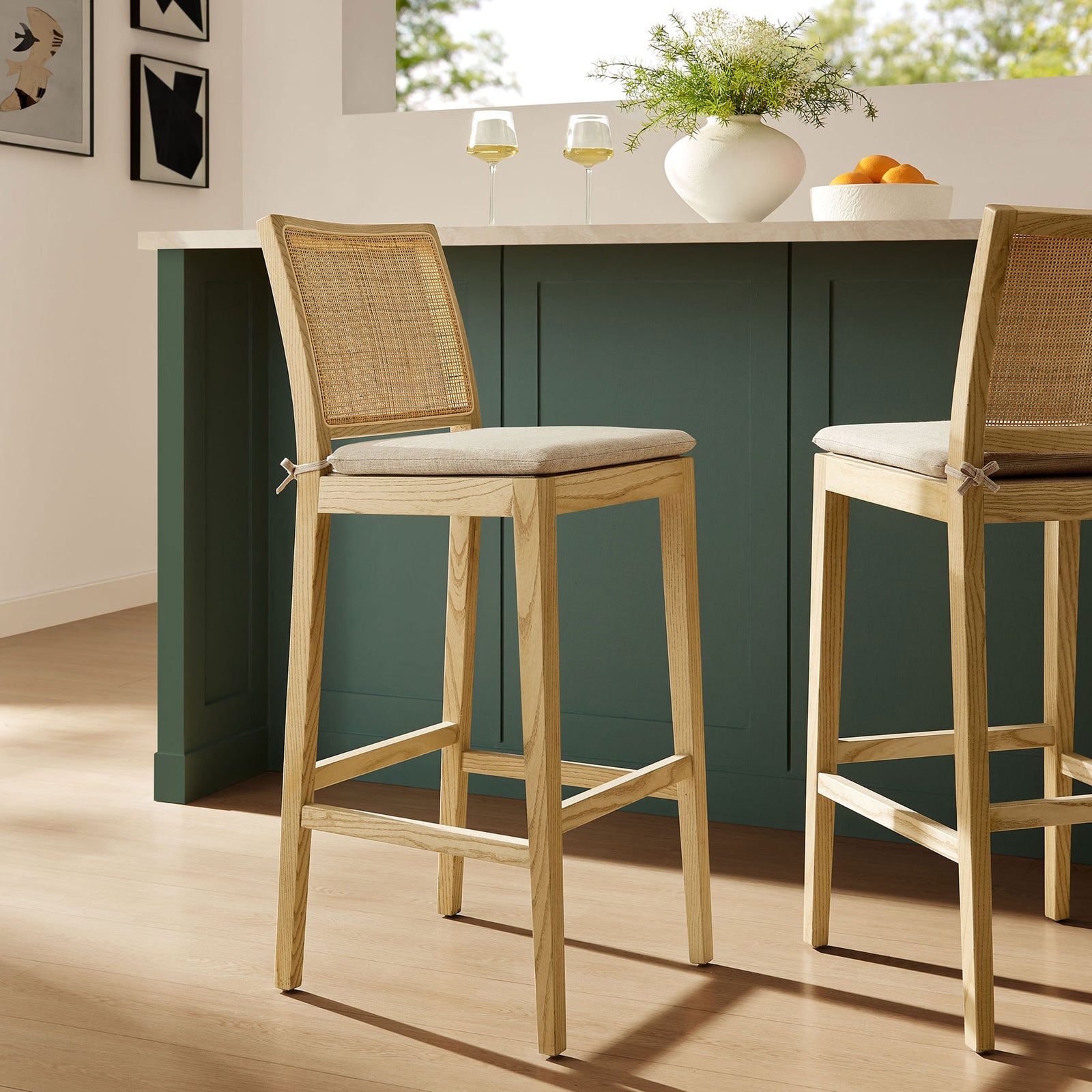 Bar stool adds natural warmth and airy texture at the kitchen island. || EEI-7289-NAT-BEI || front_angle_room