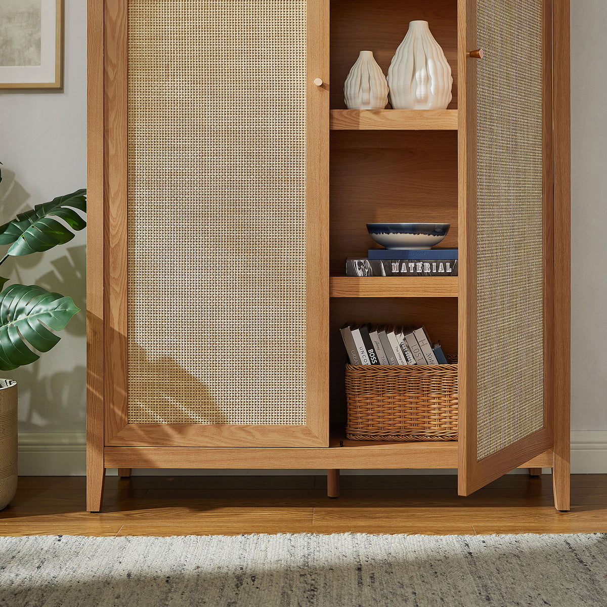 Styled natural cabinet with open door displaying woven basket and decor on adjustable shelves || EEI-7294-NAT || storage_open_room