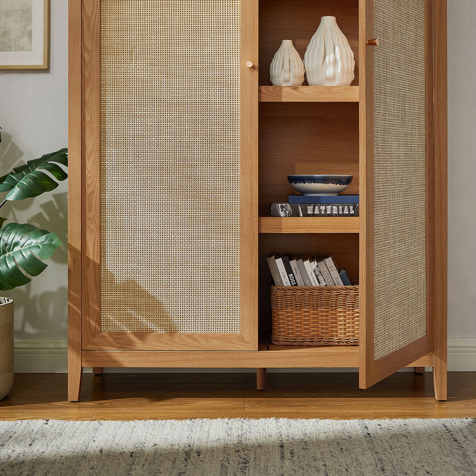 Styled natural cabinet with open door displaying woven basket and decor on adjustable shelves || EEI-7294-NAT || storage_open_room