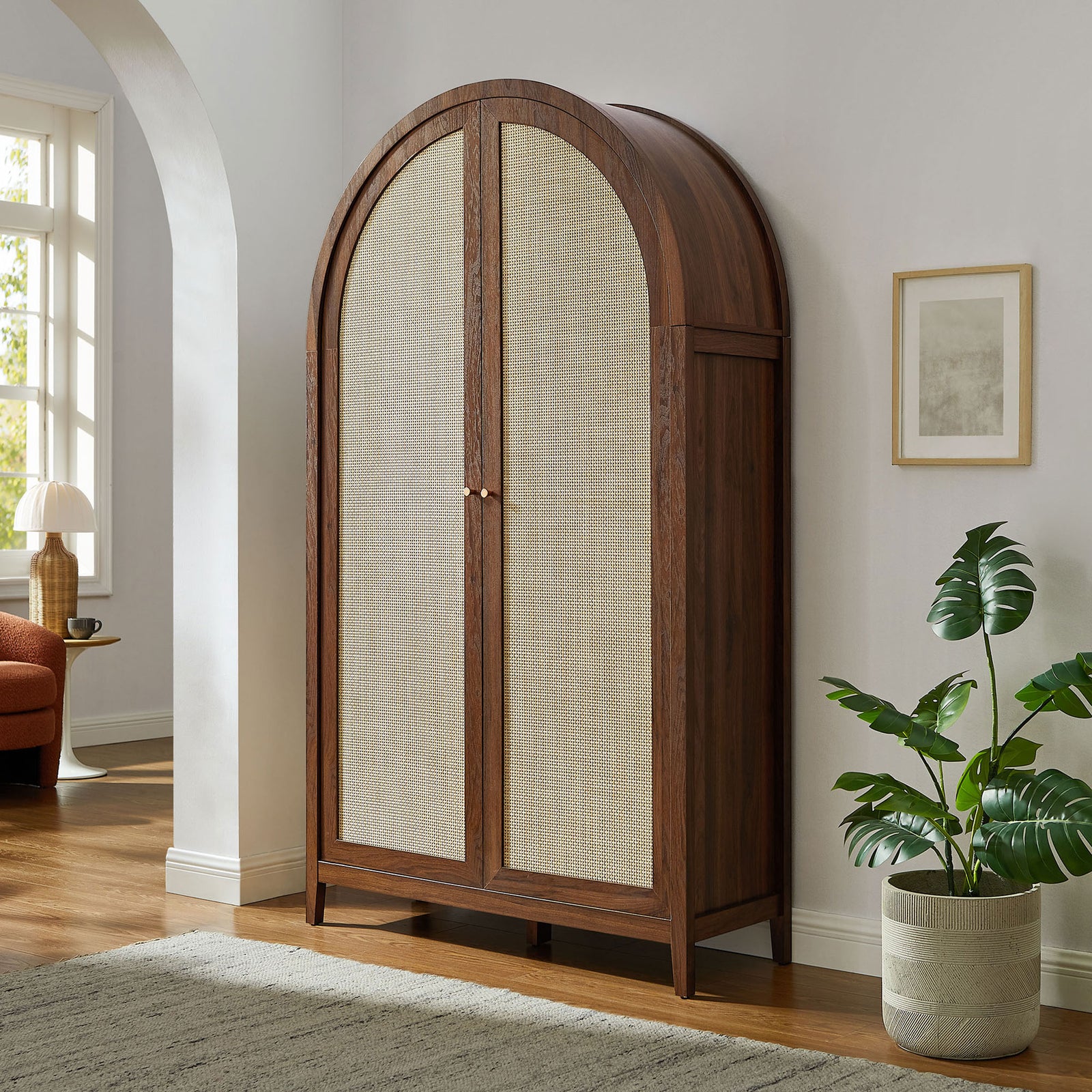 Walnut arched storage cabinet anchoring a cozy living area with warm, sophisticated character || EEI-7294-WAL || front_angle_room
