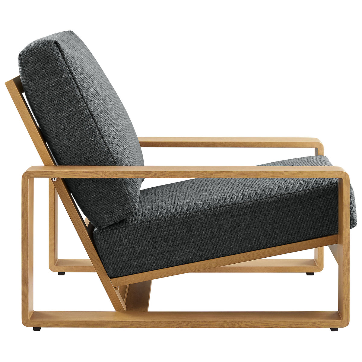 Low-profile outdoor lounge chair with angled seat and plush charcoal cushions on a natural faux wood base || EEI-7296-CHA-NAT || side_studio
