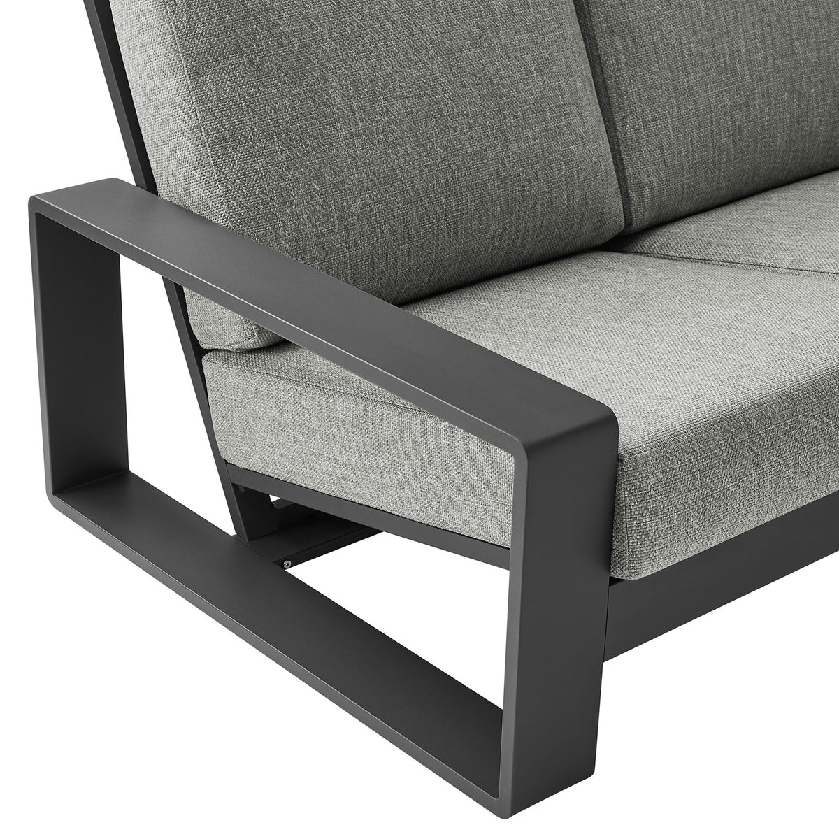 Charcoal aluminum arm paired with textured light gray upholstery, emphasizing the sofa's refined finish || EEI-7302-LGR-GRY || detail_studio