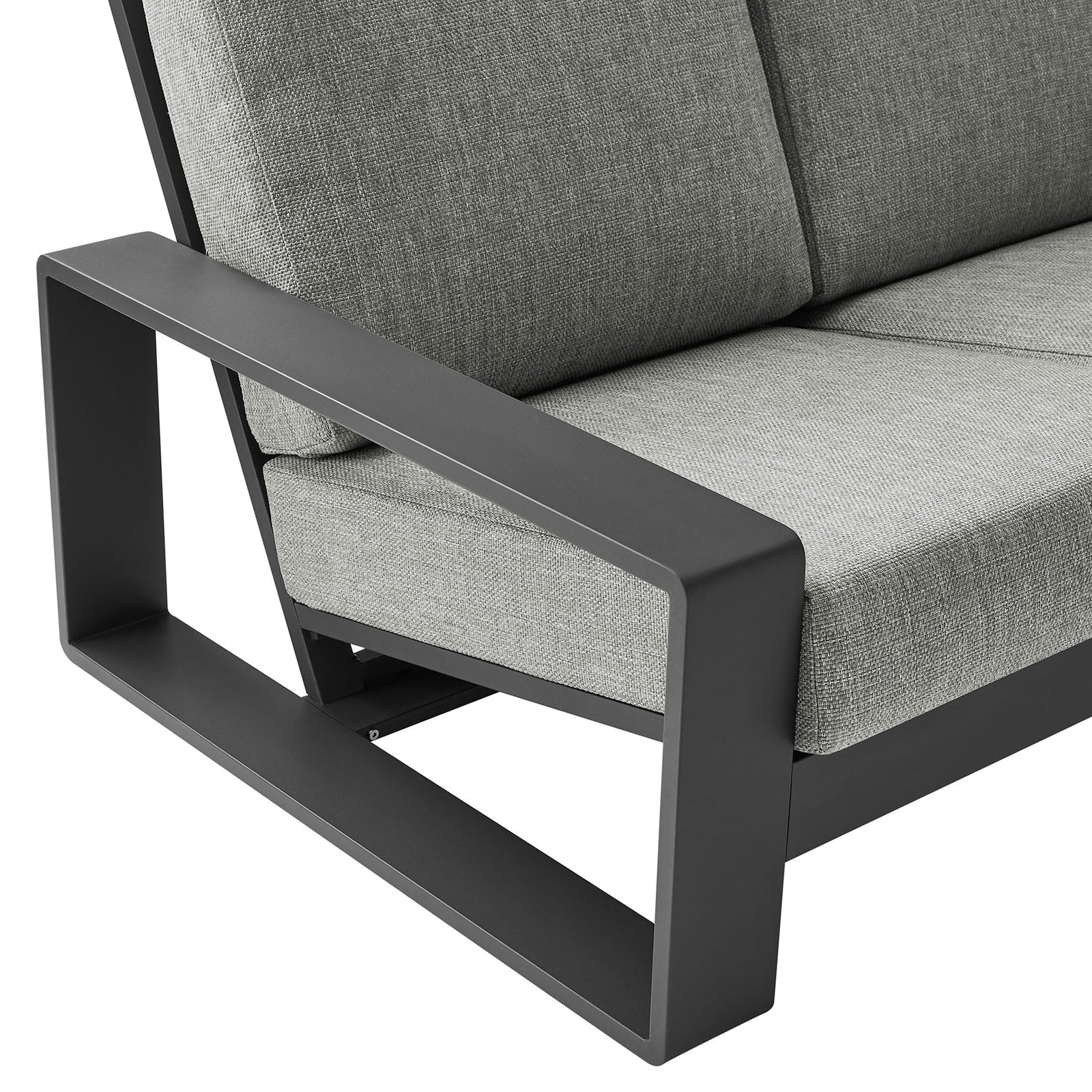Charcoal aluminum arm paired with textured light gray upholstery, emphasizing the sofa's refined finish || EEI-7302-LGR-GRY || detail_studio