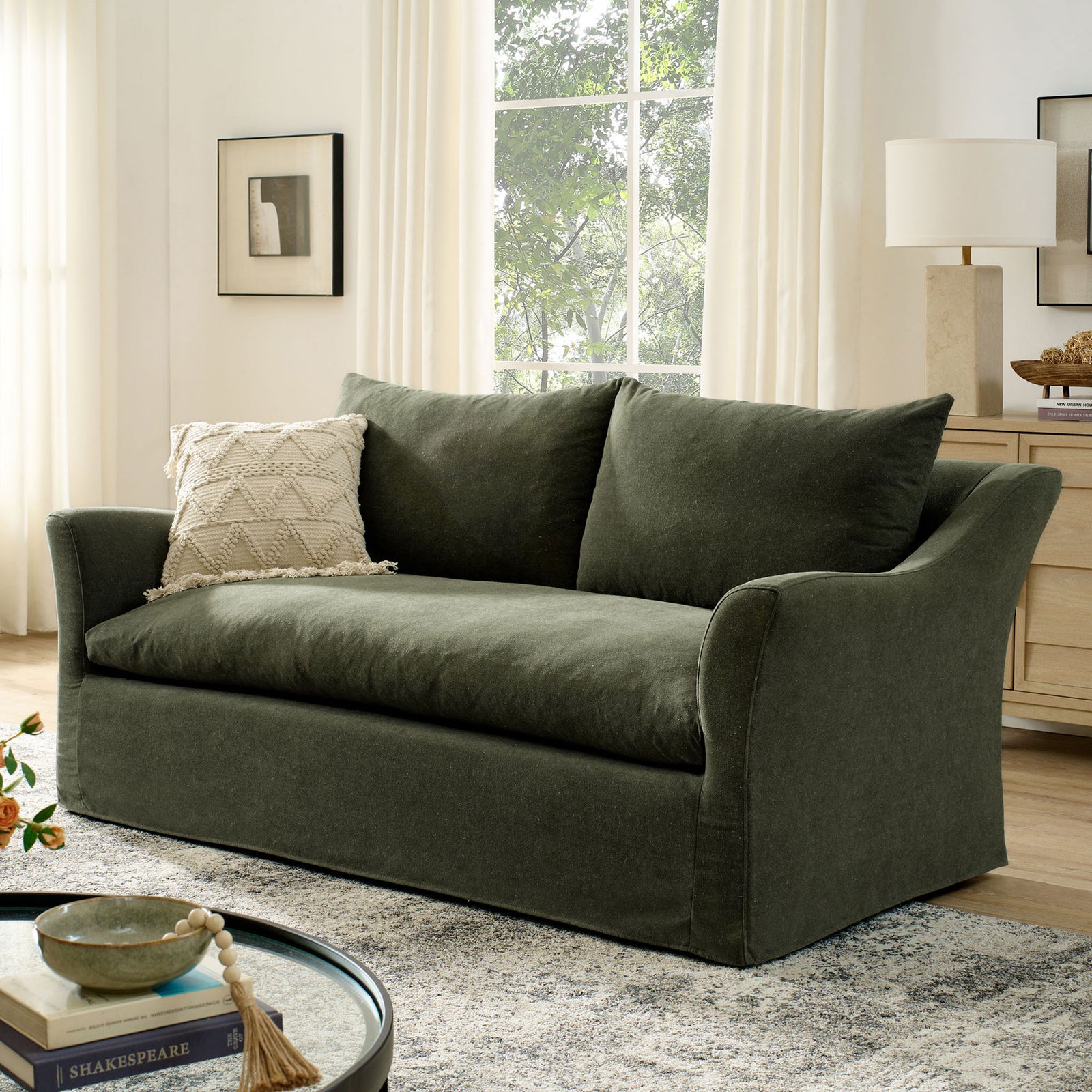 Somerset sage loveseat styled in a bright living room with cozy textures, neutral decor, and relaxed modern lines || EEI-7311-SGE || front_angle_room
