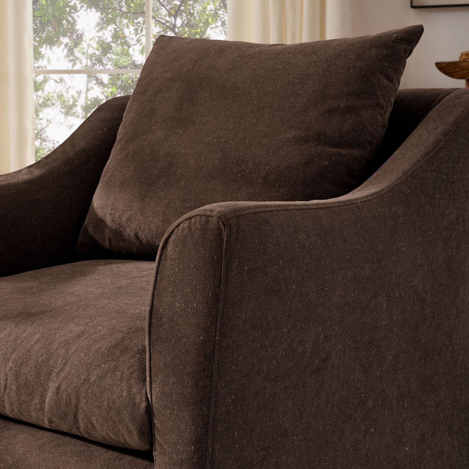 Curved arm and cushioned back showcase soft linen-blend upholstery in cocoa brown || EEI-7312-COA || detail_room