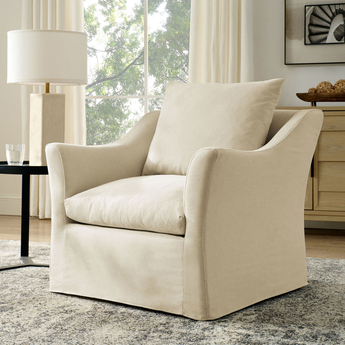 Modern farmhouse charm meets minimalist lines in this cozy linen-blend armchair || EEI-7312-LIN || front_angle_room