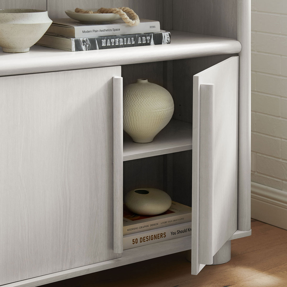 Lower cabinet storage with an adjustable interior shelf and modern elongated pulls || EEI-7314-ASH || detail_room
