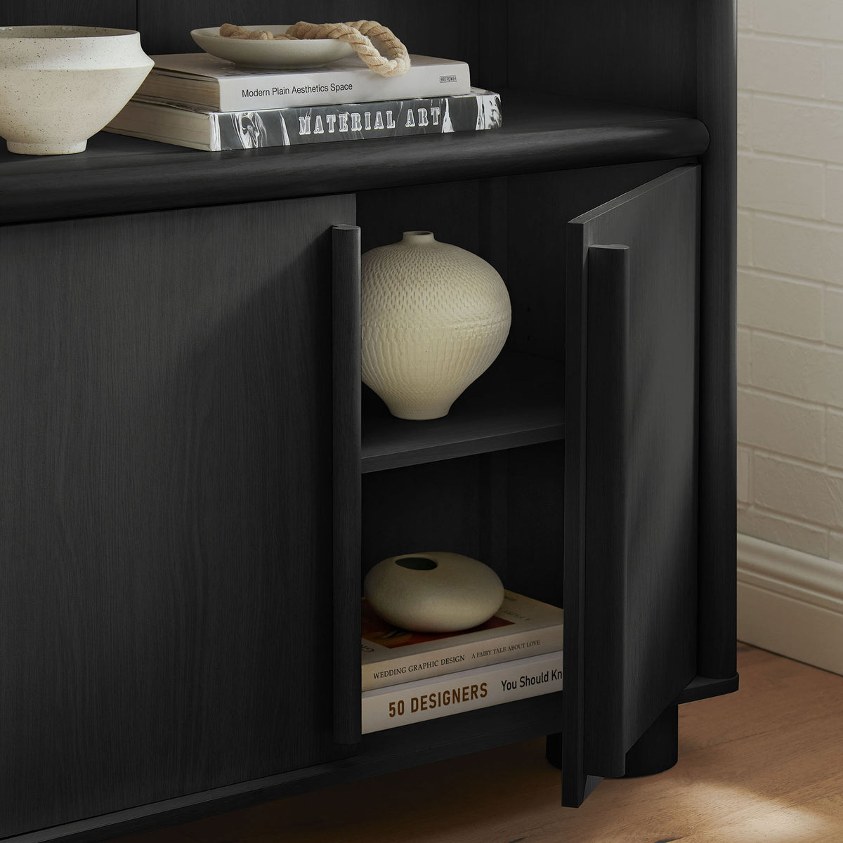 Interior storage keeps clutter out of sight with hinged doors and an adjustable shelf || EEI-7314-BLK || storage_open_room