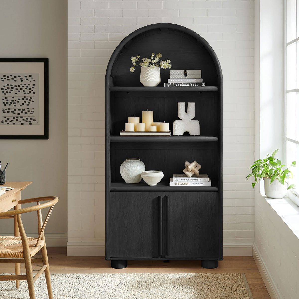 Arched display cabinet brings modern warmth to a living space with generous shelving || EEI-7314-BLK || front_room