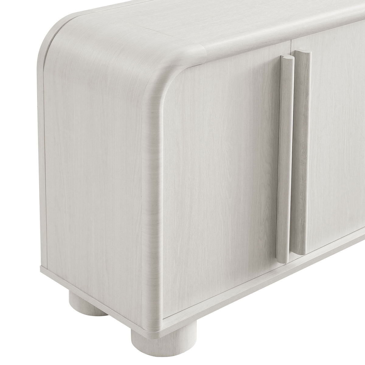 Detail of elongated door pulls and softly rounded corner on the ash wood grain cabinet || EEI-7315-ASH || handle_studio
