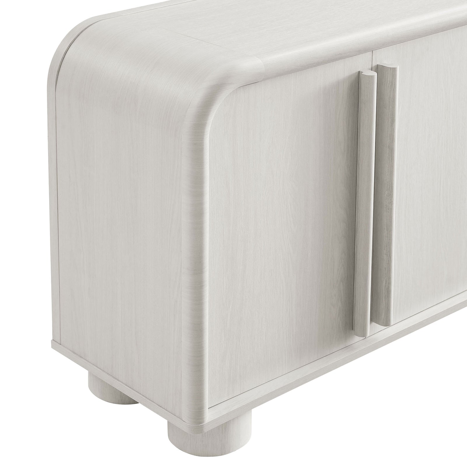Detail of elongated door pulls and softly rounded corner on the ash wood grain cabinet || EEI-7315-ASH || handle_studio