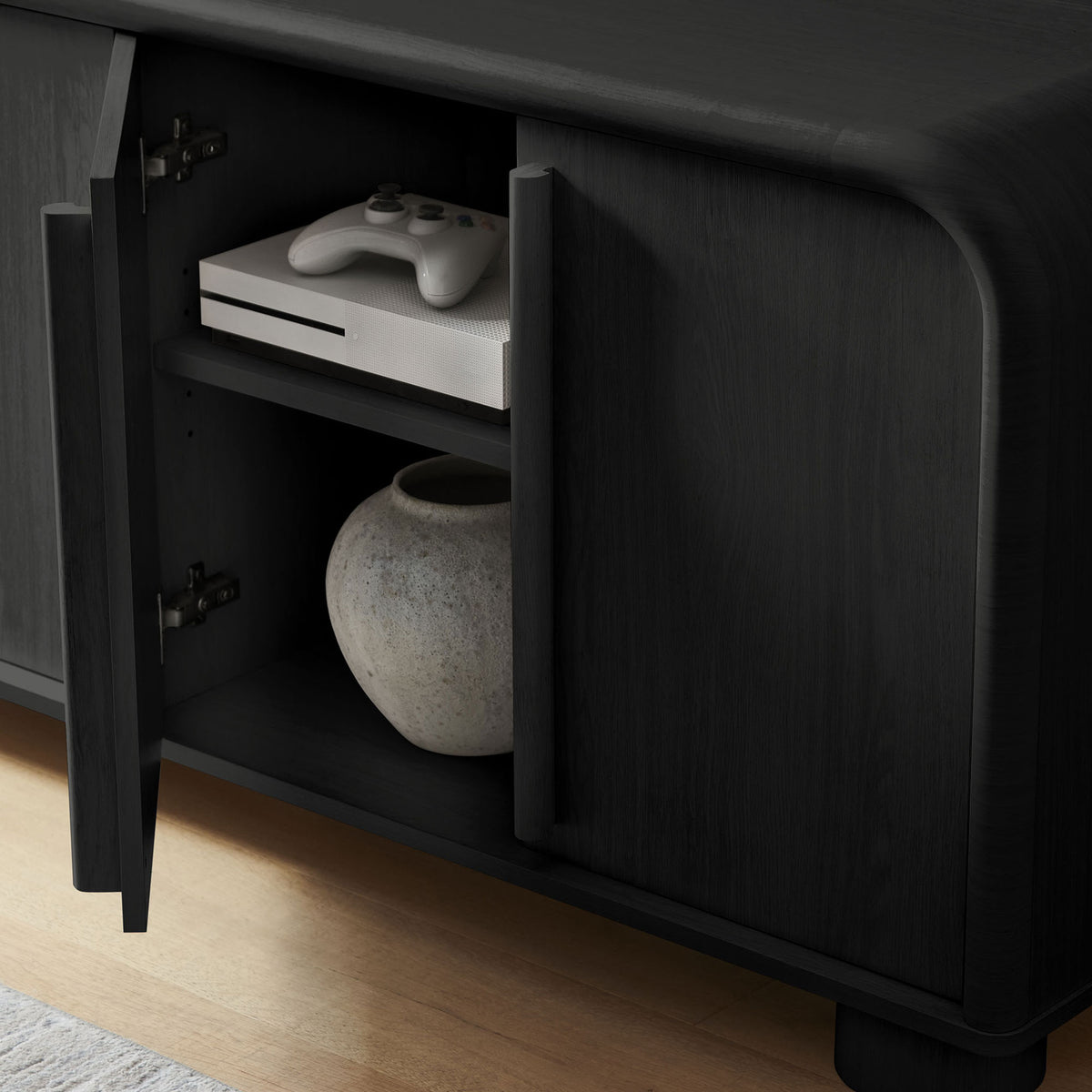Open cabinet storage displaying an entertainment console and vase inside the Bellamy black oak sideboard || EEI-7315-BLK || storage_open_room
