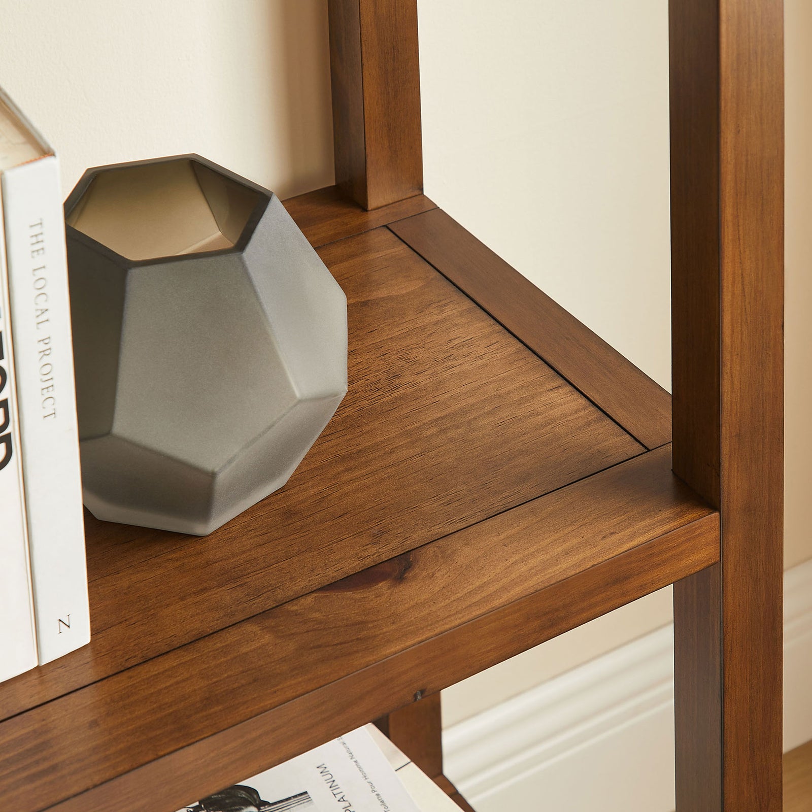 Sturdy shelf surface showcases decor and books with clean joinery and smooth finish || EEI-7316-WAL || detail_room