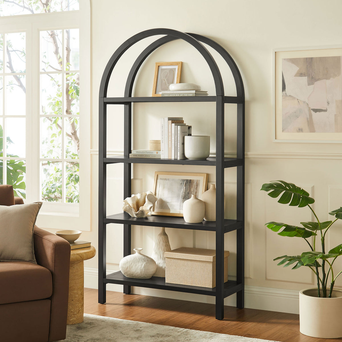 Statement arched bookcase anchors the room with generous storage and sculptural lines || EEI-7318-BLK || front_angle_room