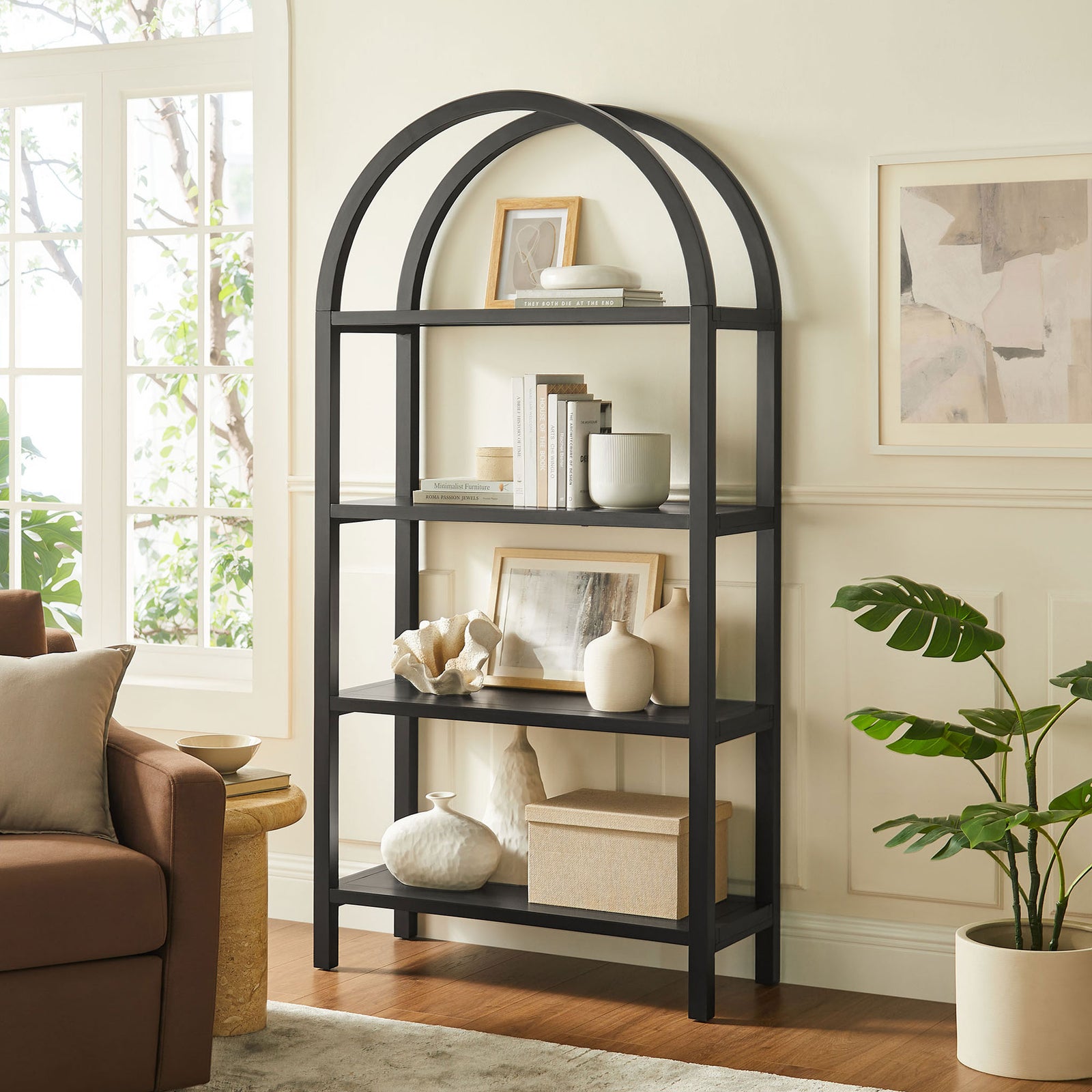 Statement arched bookcase anchors the room with generous storage and sculptural lines || EEI-7318-BLK || front_angle_room