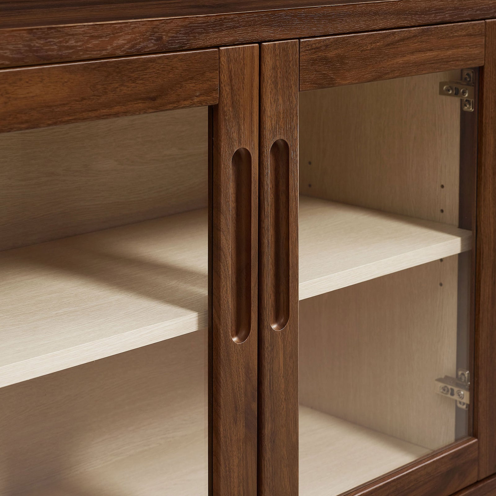 Framed glass doors with integrated finger-pull handles and light wood interior shelves || EEI-7319-WAL-ASH || handle_studio