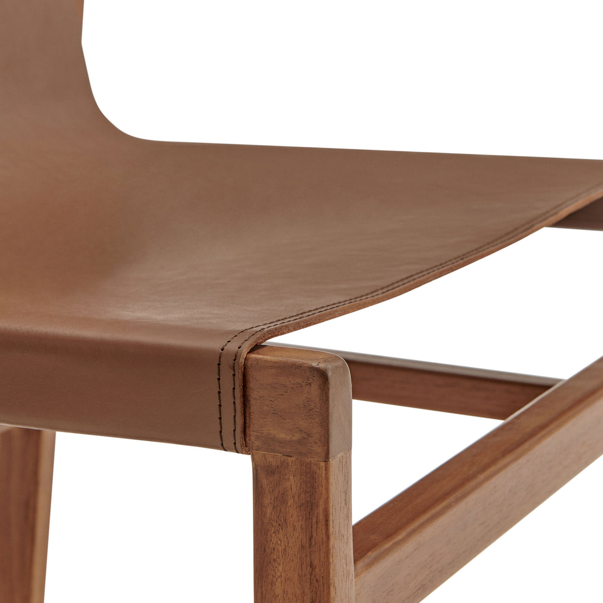 Front seat edge features tailored stitching and warm teak corner detail || EEI-7326-NUT || detail_studio