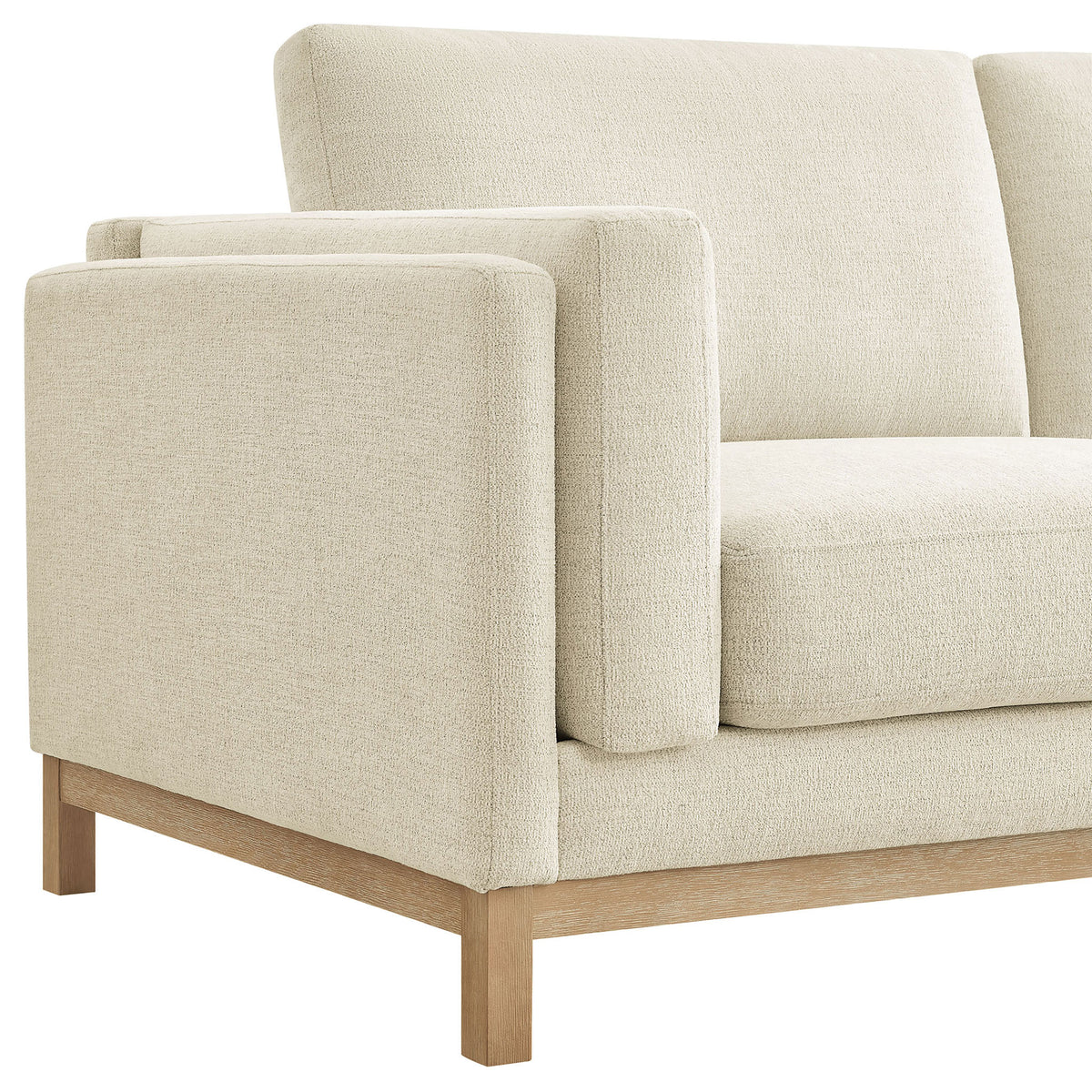 Padded arm and seat corner highlighting the soft textured ivory chenille upholstery and wood base || EEI-7327-IVO || detail_studio