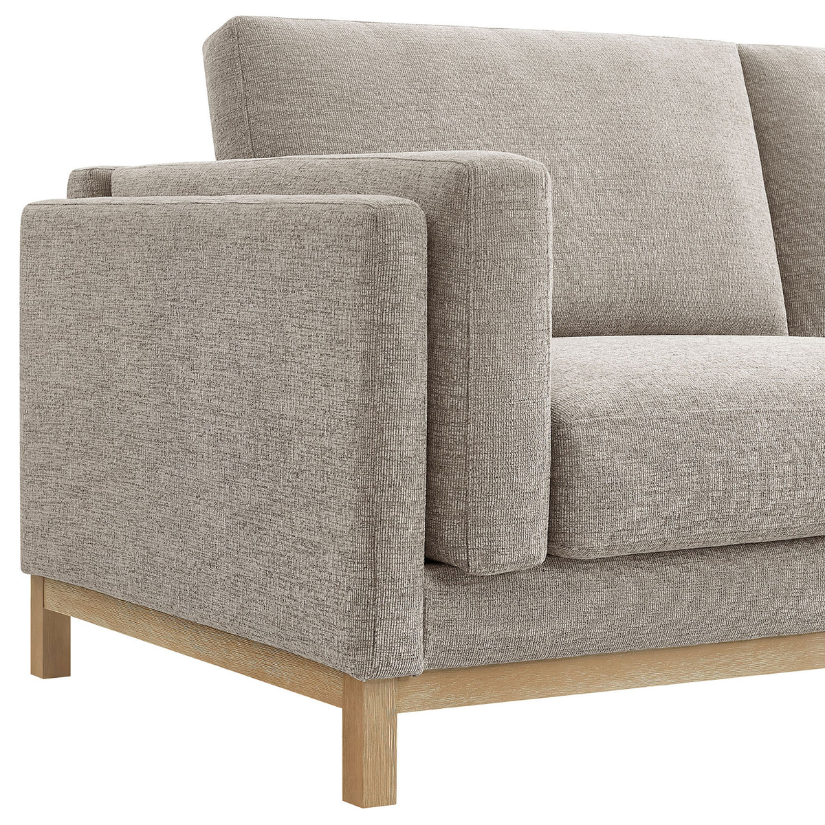 Roscoe sofa arm detail with plush cushions, crisp tailoring, and a warm wood base || EEI-7327-PEW || detail_studio
