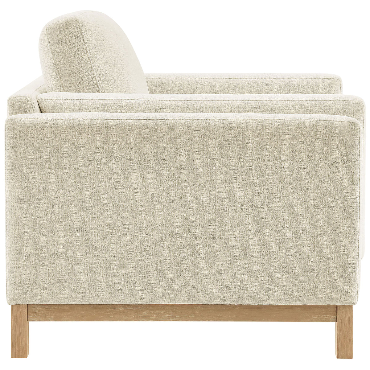 Sleek track arms and a supportive backrest upholstered in soft melange chenille || EEI-7329-IVO || side_studio