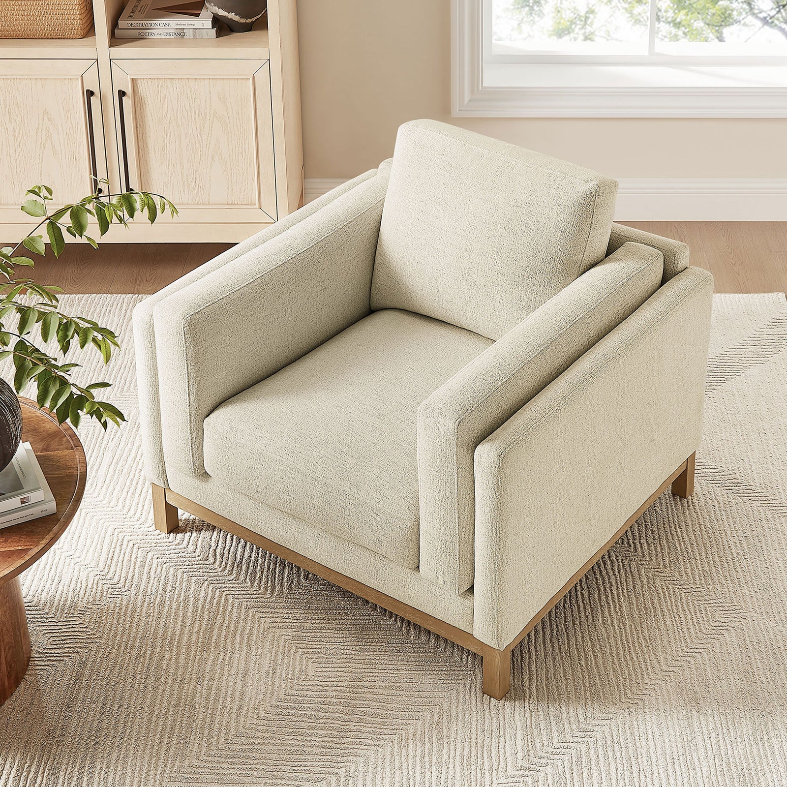 Compact footprint and low profile make this chenille armchair easy to place || EEI-7329-IVO || top_angle_room