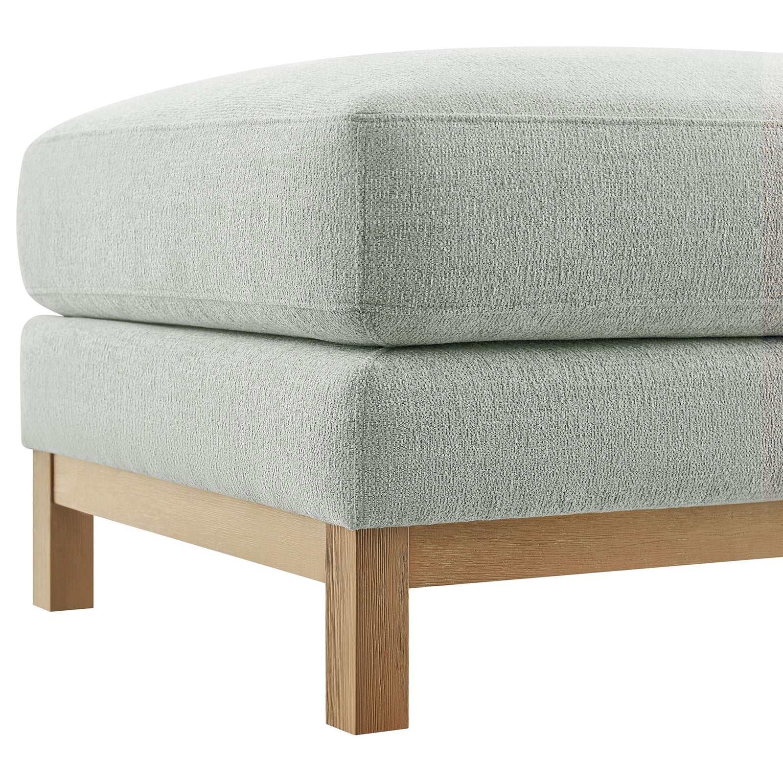 Corner of mist chenille ottoman showcasing tailored seams and smooth wood leg || EEI-7330-MST || detail_studio