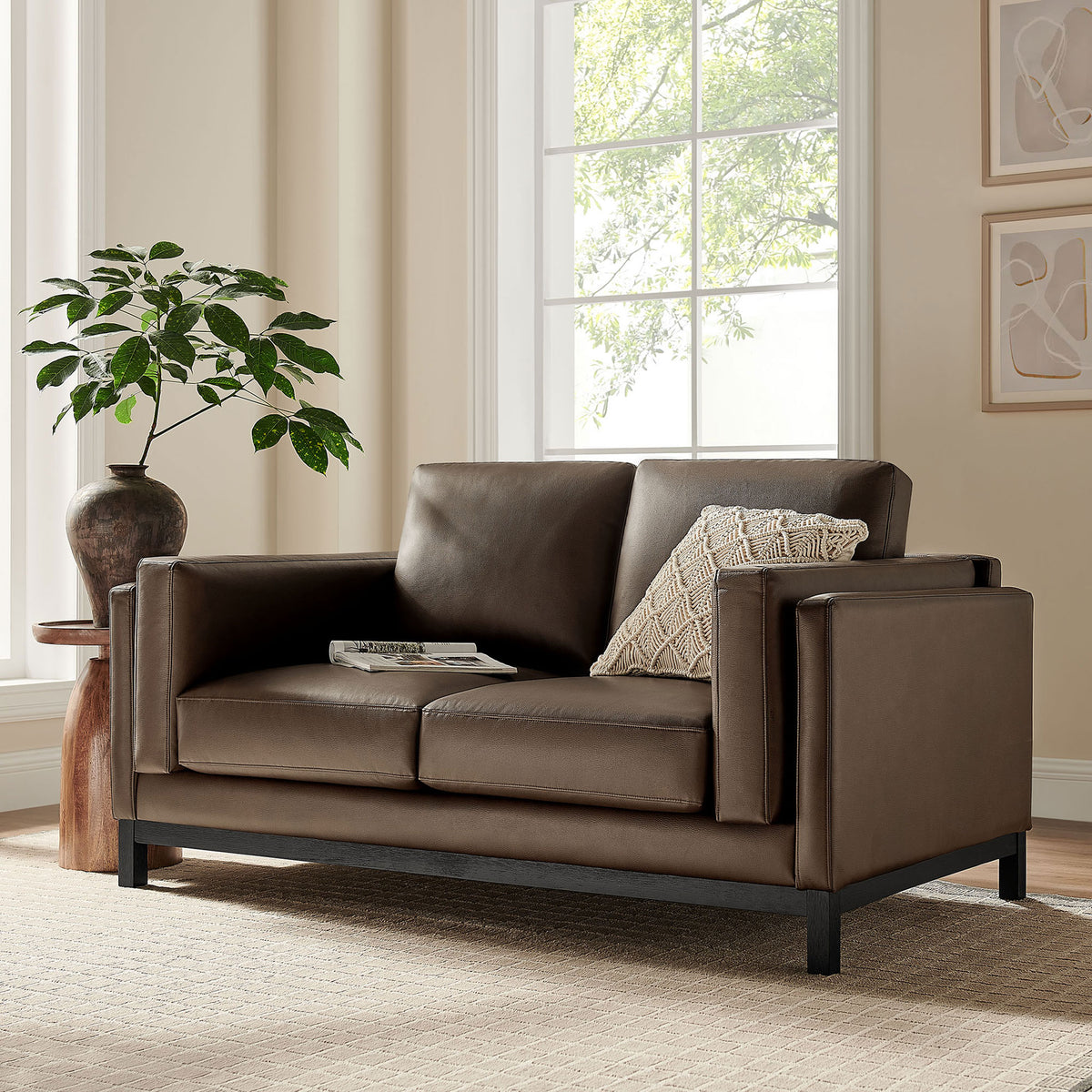 Espresso vegan leather loveseat styled in a modern living room with soft rug, artwork, and greenery || EEI-7336-ESP || front_angle_room