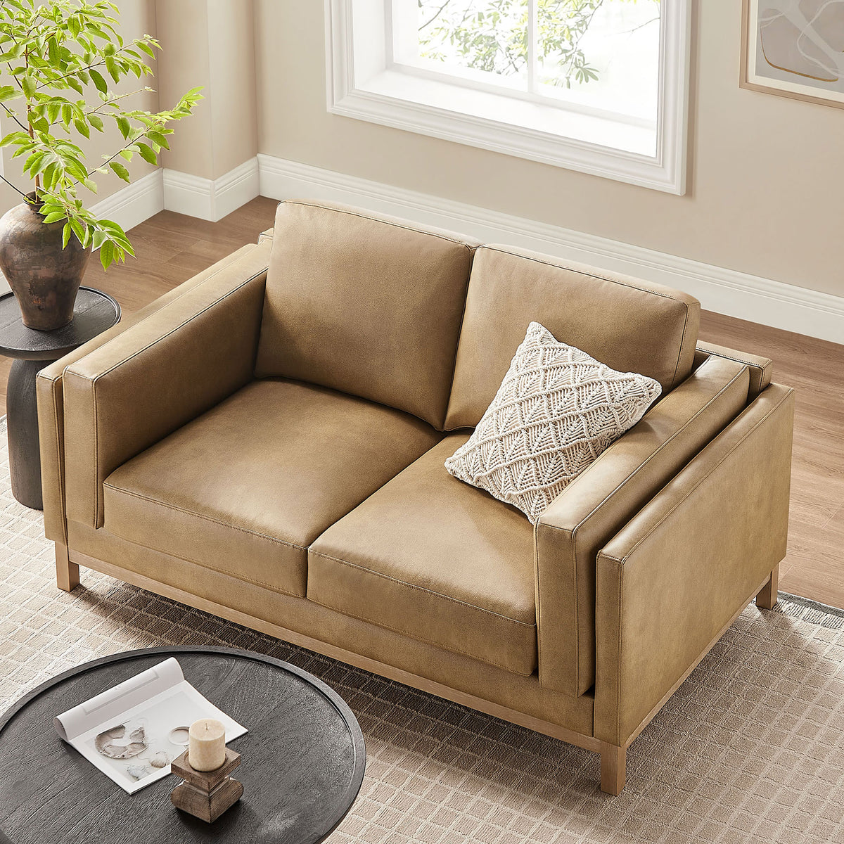 Deep cushions, wide arms, and compact footprint make this loveseat ideal for small spaces || EEI-7336-TST || top_angle_room