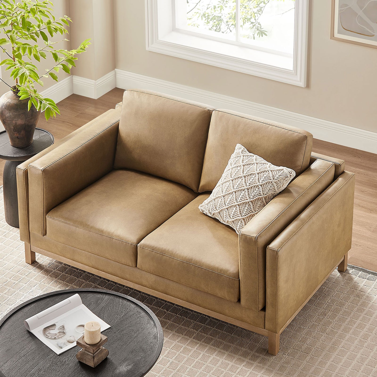 Deep cushions, wide arms, and compact footprint make this loveseat ideal for small spaces || EEI-7336-TST || top_angle_room