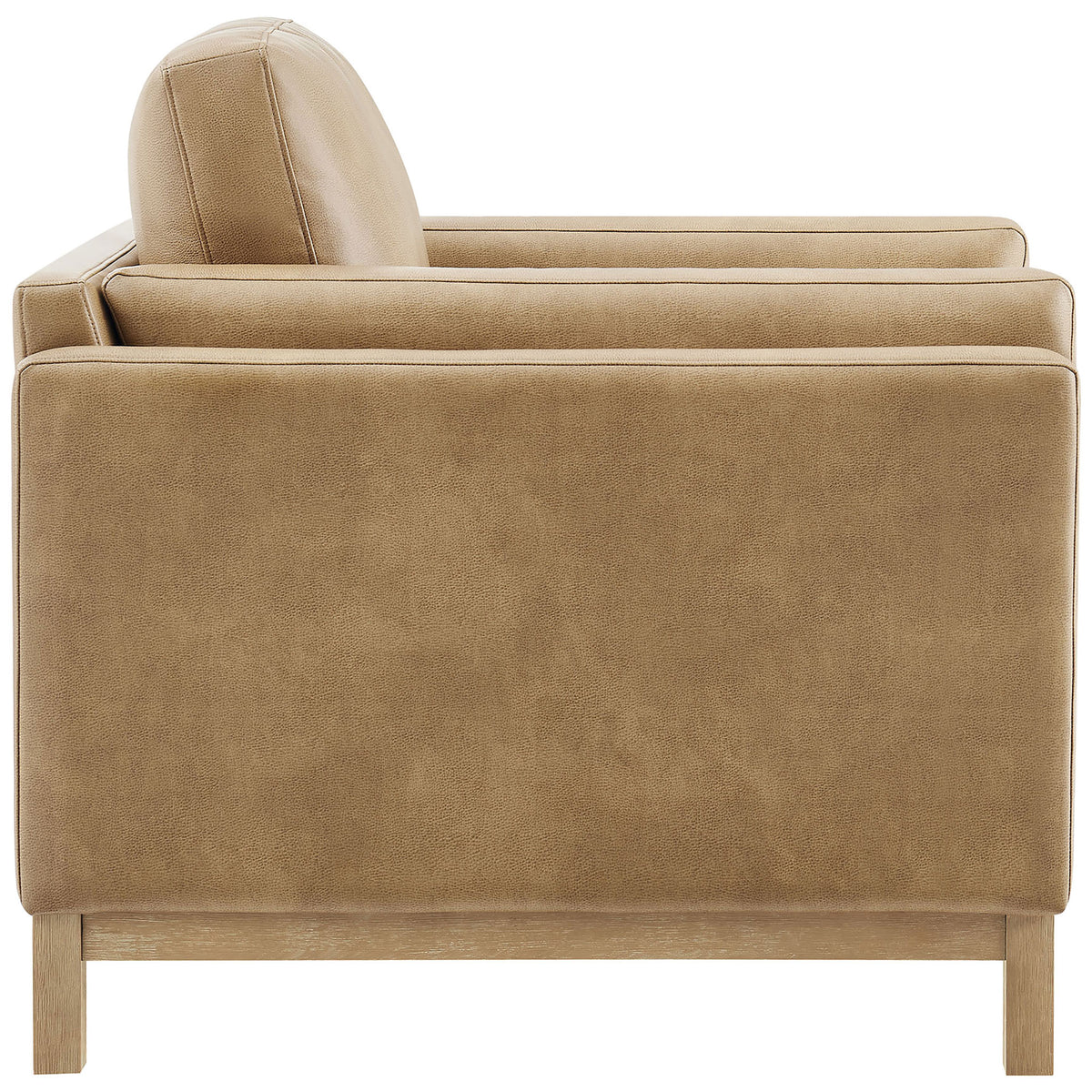 Streamlined profile highlights plush cushions and double track arms on this toast vegan leather chair. || EEI-7337-TST || side_studio