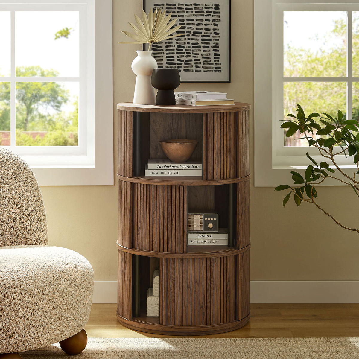 Walnut tambour storage table with doors retracted to display layered shelves for books, bowls, and decor accents || EEI-7344-WAL || front_open_room