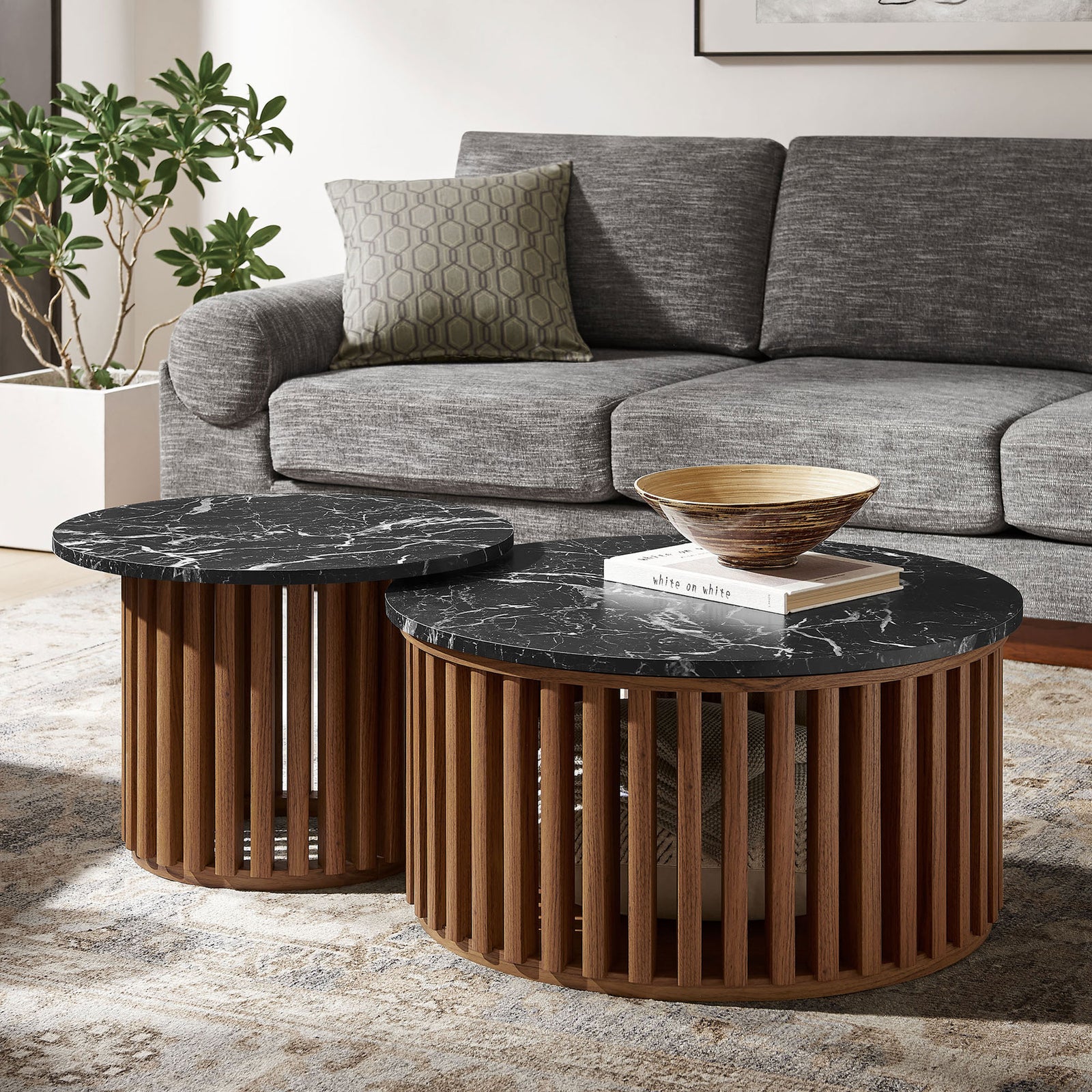 Modern nesting tables complement sofas with warm walnut tones and striking black marble pattern. || EEI-7345-WAL-BLK || front_angle_room