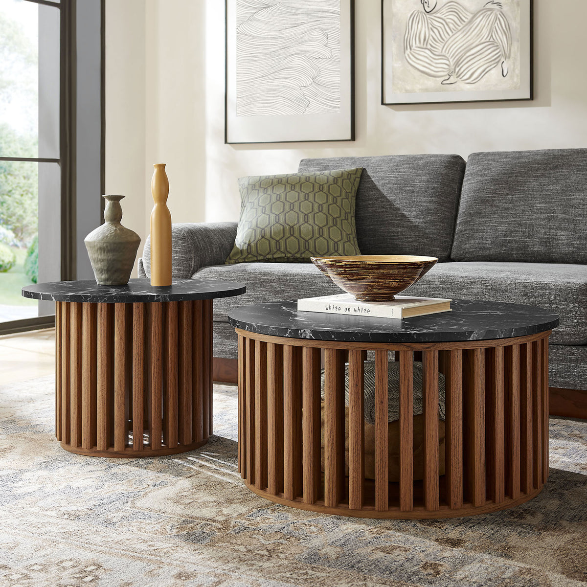 Sculptural slatted bases and bold marble tops anchor the room with contemporary style. || EEI-7345-WAL-BLK || front_angle_room