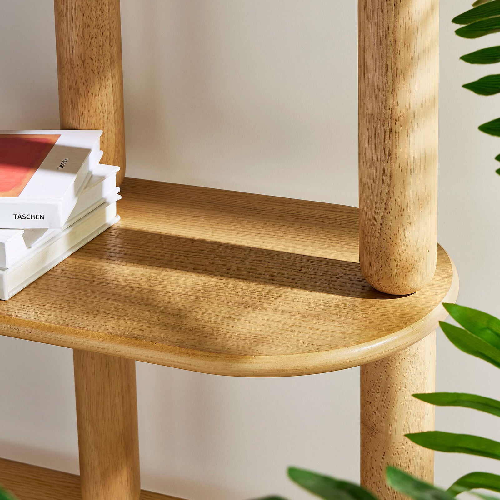 Rounded edges and spacious shelves are perfect for books, records, and decor || EEI-7347-OAK || detail_room