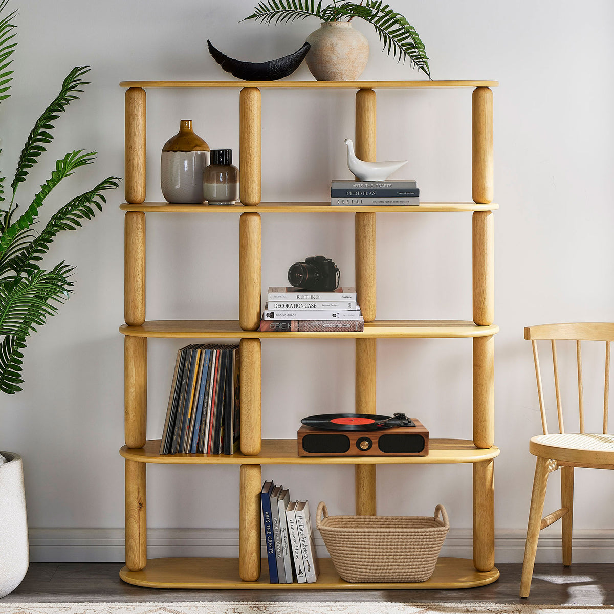 Warm oak tone and open tiers showcase books and decor with inviting, modern character || EEI-7347-OAK || front_room