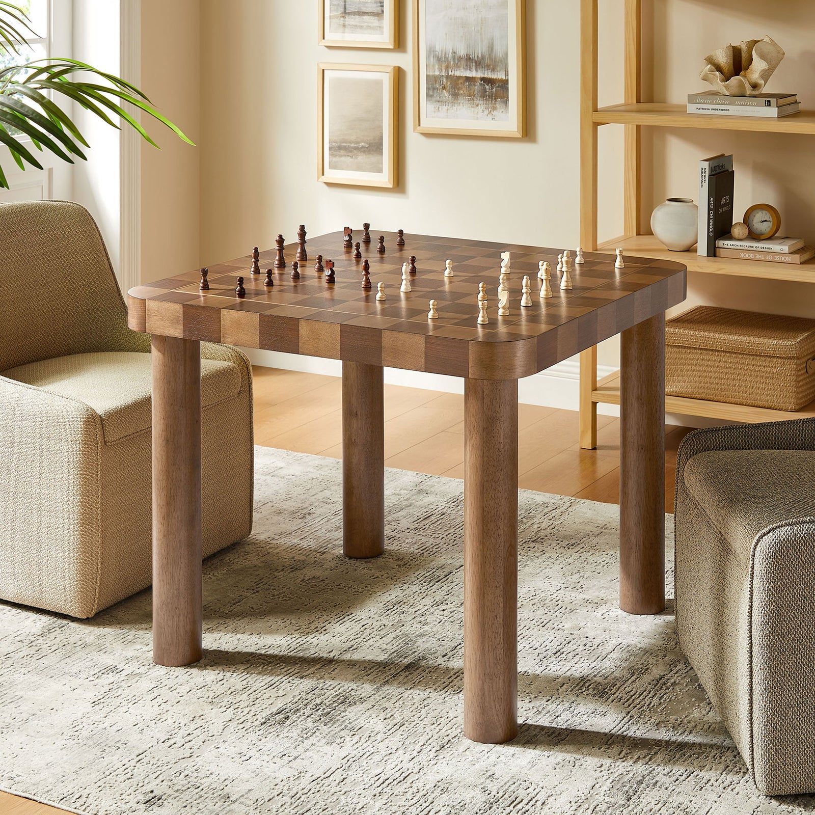 Square checkered game table set up for chess in a cozy living room seating area || EEI-7351-DWC || front_angle_room