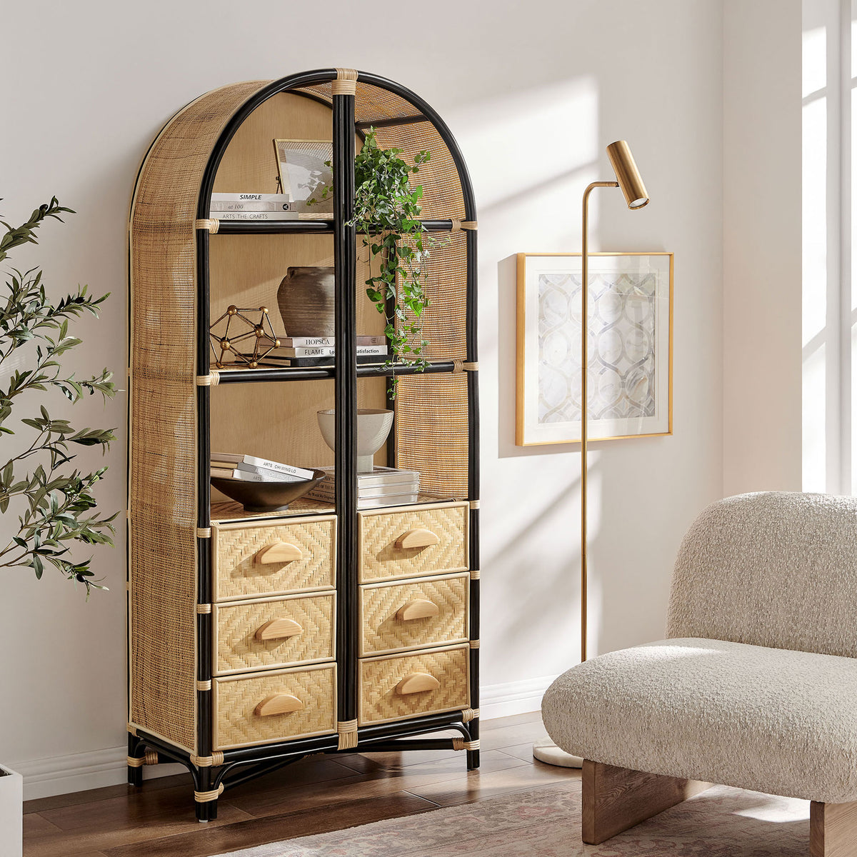 Elevate any room with an arched rattan bookcase featuring open shelves and six woven drawers || EEI-7362-NAT-BLK || front_angle_room