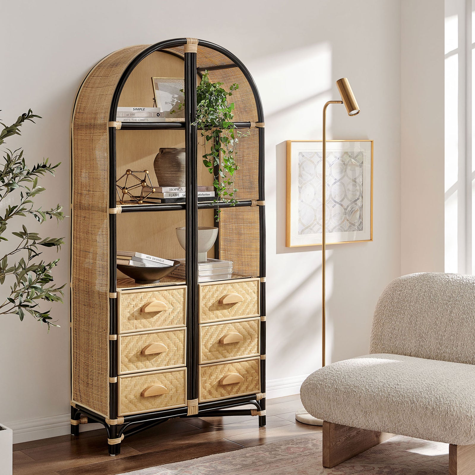 Elevate any room with an arched rattan bookcase featuring open shelves and six woven drawers || EEI-7362-NAT-BLK || front_angle_room