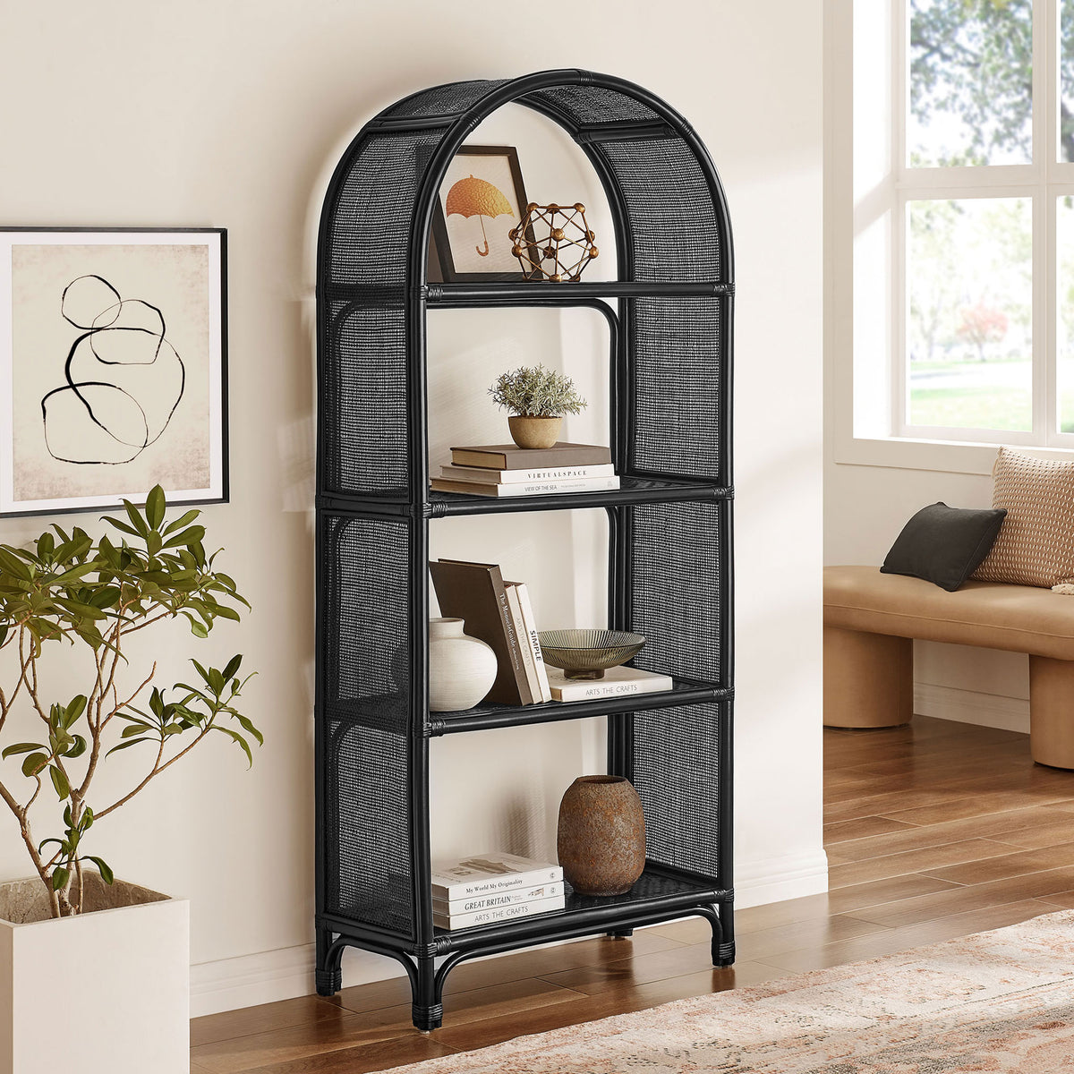 Statement arched rattan bookshelf elevates a cozy corner with open, versatile storage || EEI-7363-BLK || front_angle_room