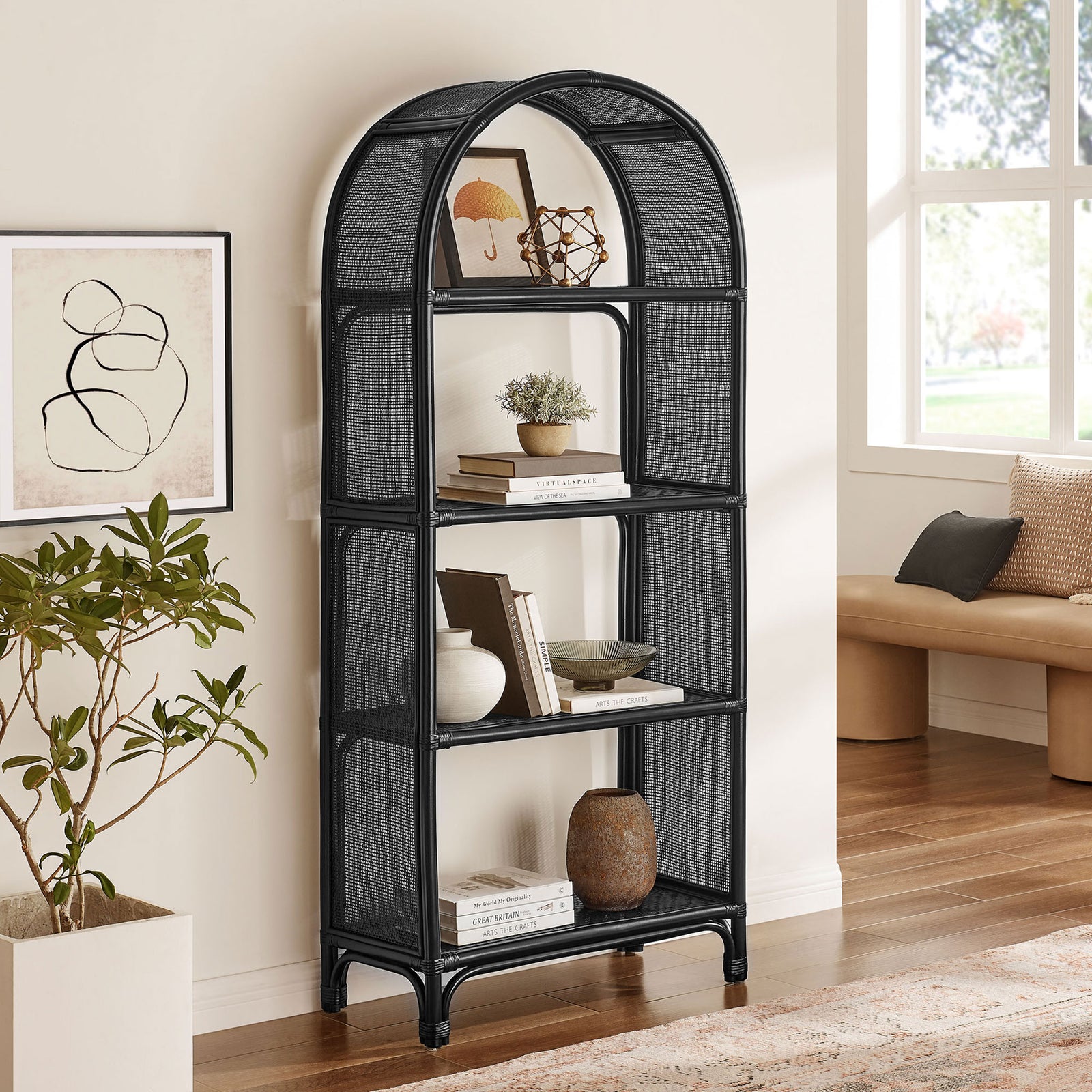 Statement arched rattan bookshelf elevates a cozy corner with open, versatile storage || EEI-7363-BLK || front_angle_room