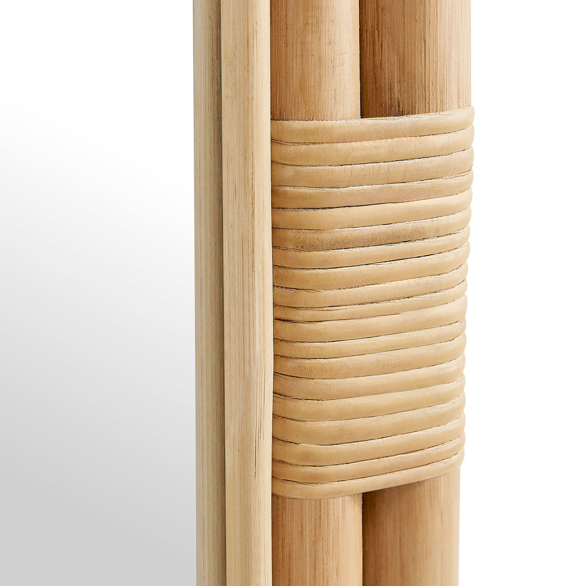 Corsica oval mirror detail highlighting wrapped rattan band and smooth rounded frame || EEI-7364-NAT || detail_studio