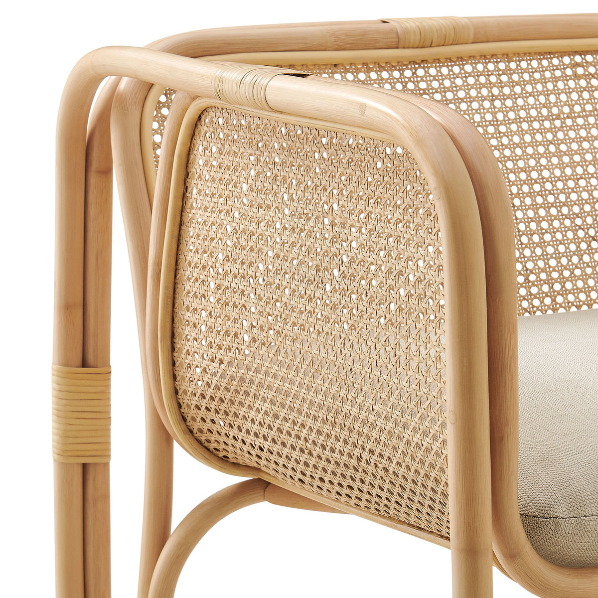 Handwoven cane and smooth rattan bends highlight craftsmanship and texture || EEI-7365-NAT || detail_studio