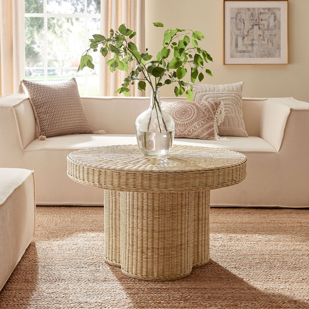 Airy rattan coffee table anchors a cozy living room with relaxed, coastal charm || EEI-7370-NAT || front_angle_room