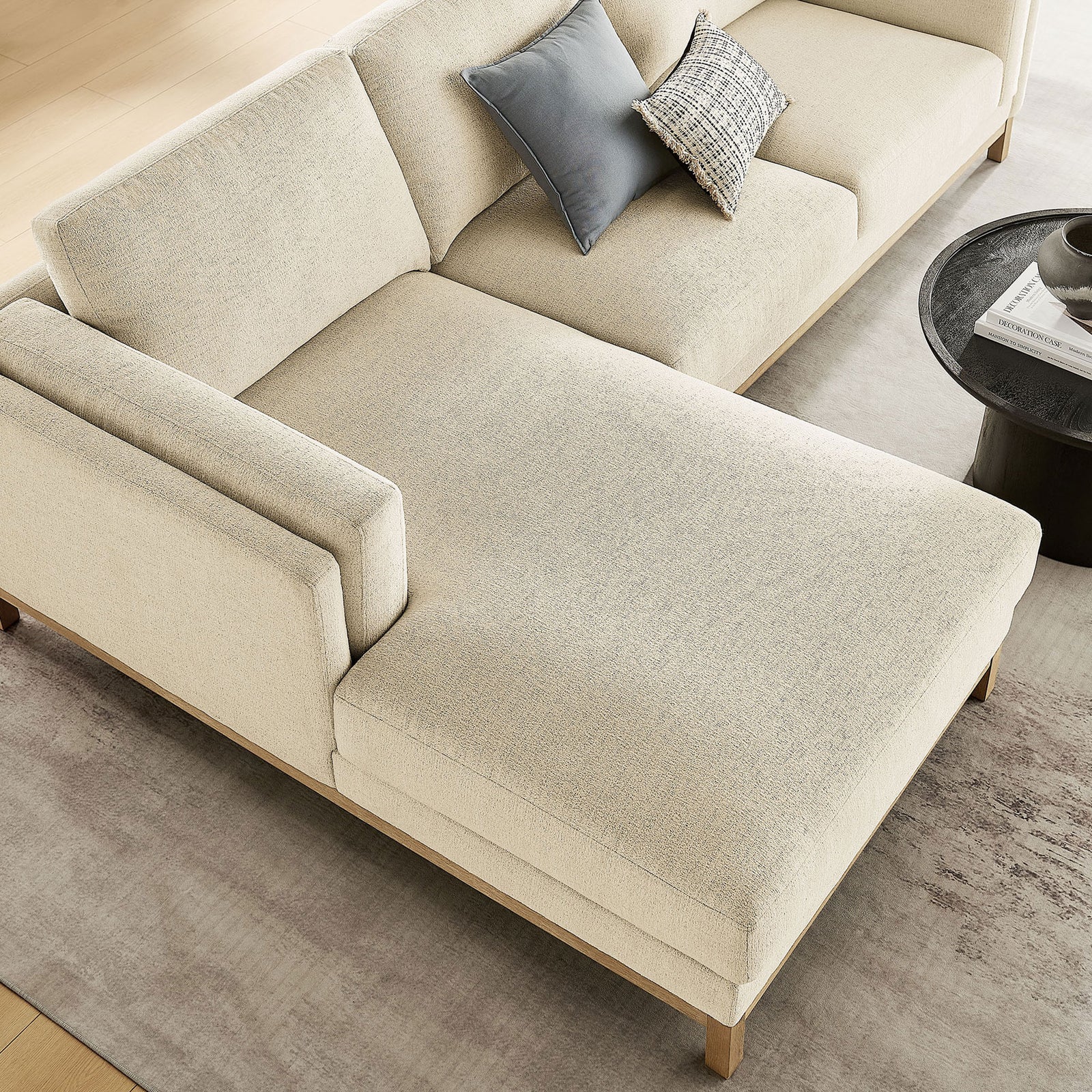 Cozy ivory chaise corner styled with accent pillows, highlighting the soft melange chenille upholstery || EEI-7374-IVO || detail_room