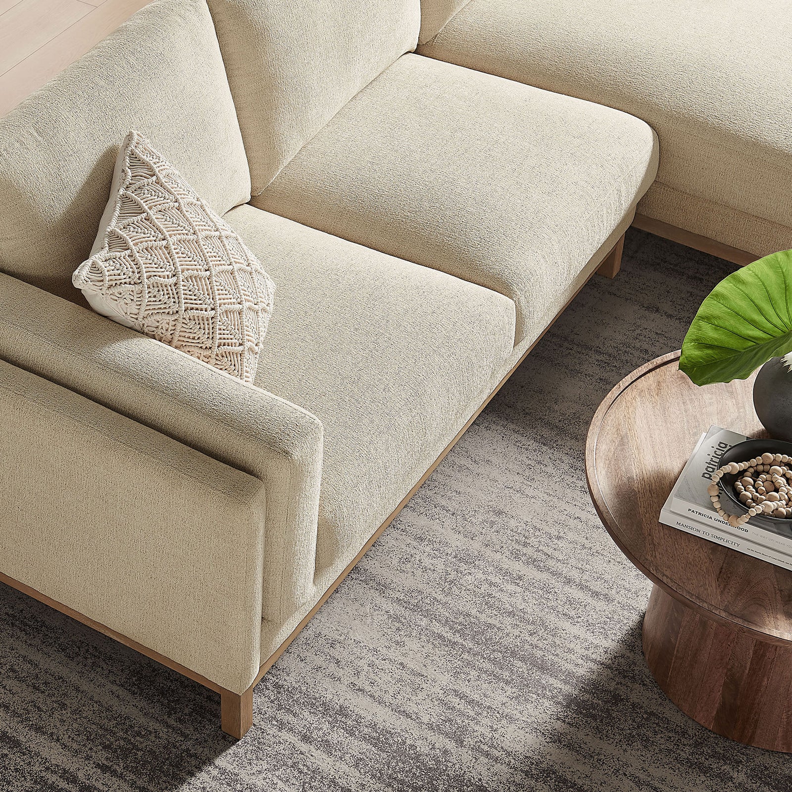 Sectional corner in ivory chenille, showcasing textured upholstery, plush seating, and a patterned accent pillow || EEI-7375-IVO || detail_room