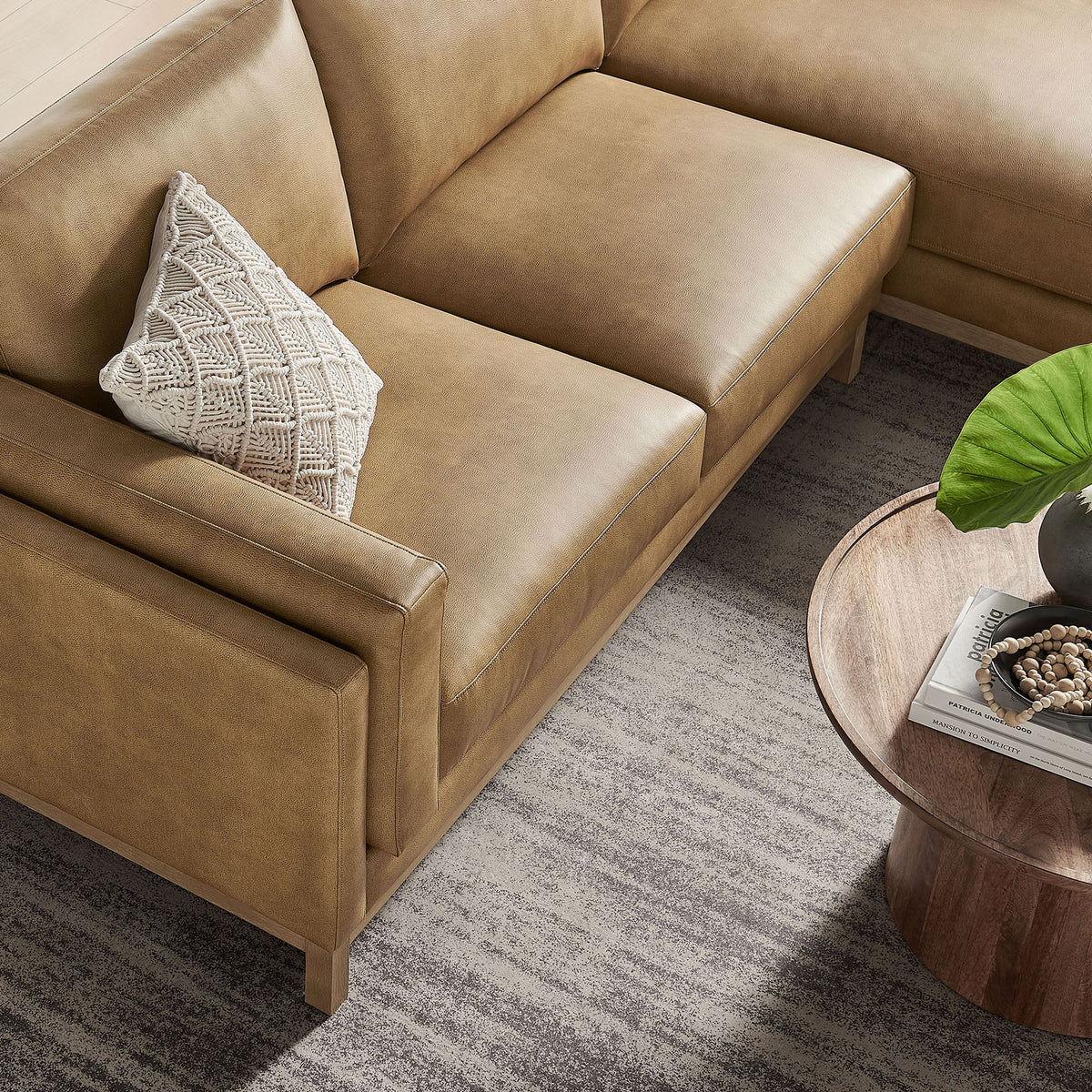 Textured toast vegan leather seat cushions on Roscoe sectional with round wood table || EEI-7377-TST || detail_room